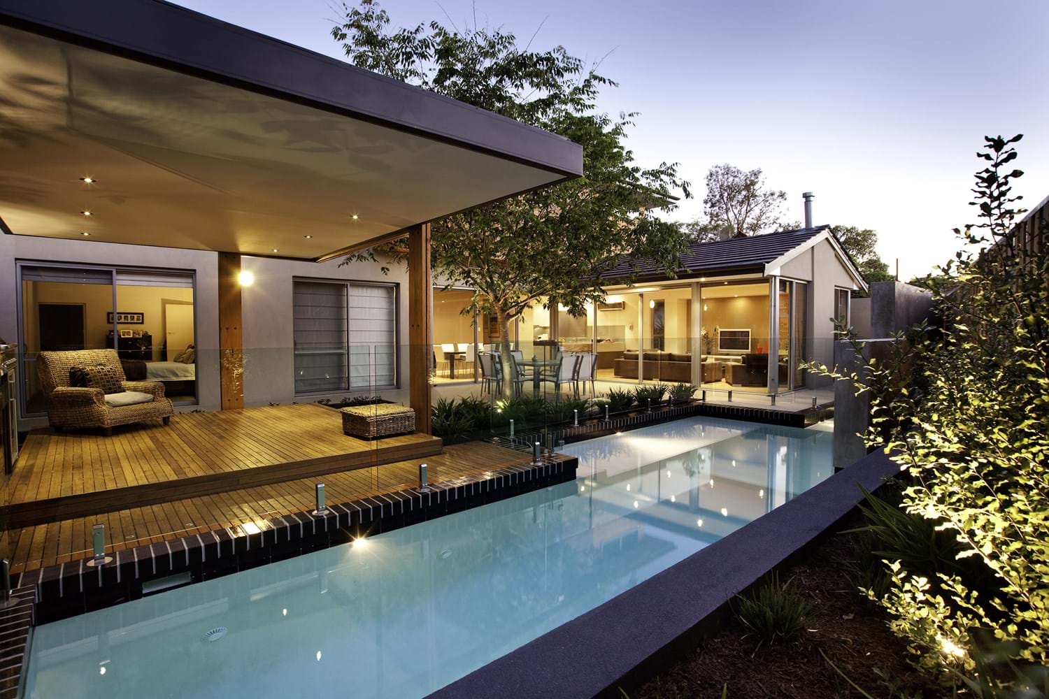 The brief called for an open mixed-use space, to include a pool with water feature and pavilion that enhances the visual transparency to the landscape from the house. A key requirement from the client was to achieve a high-quality architectural finish and create characteristics individual to the design like the glazed black brick capping to the pool and pavilion.